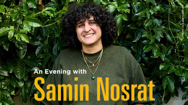Samin Nosrat stands in front of a wall of leaves.