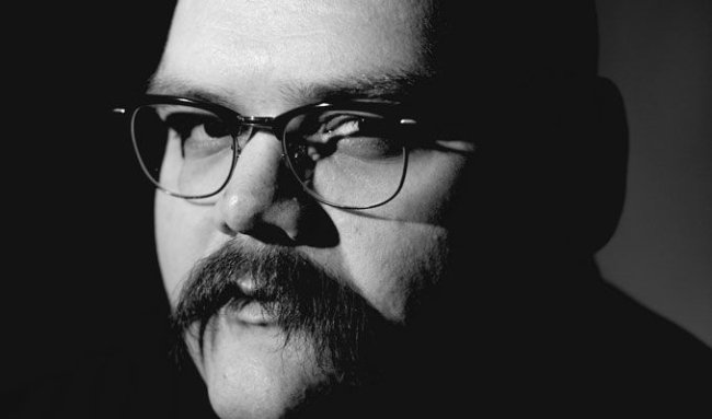 Image Source: https://images.discovery-prod.axs.com/2025/03/john-moreland-tickets_08-12-25_17_67eaf4fccac34.jpg